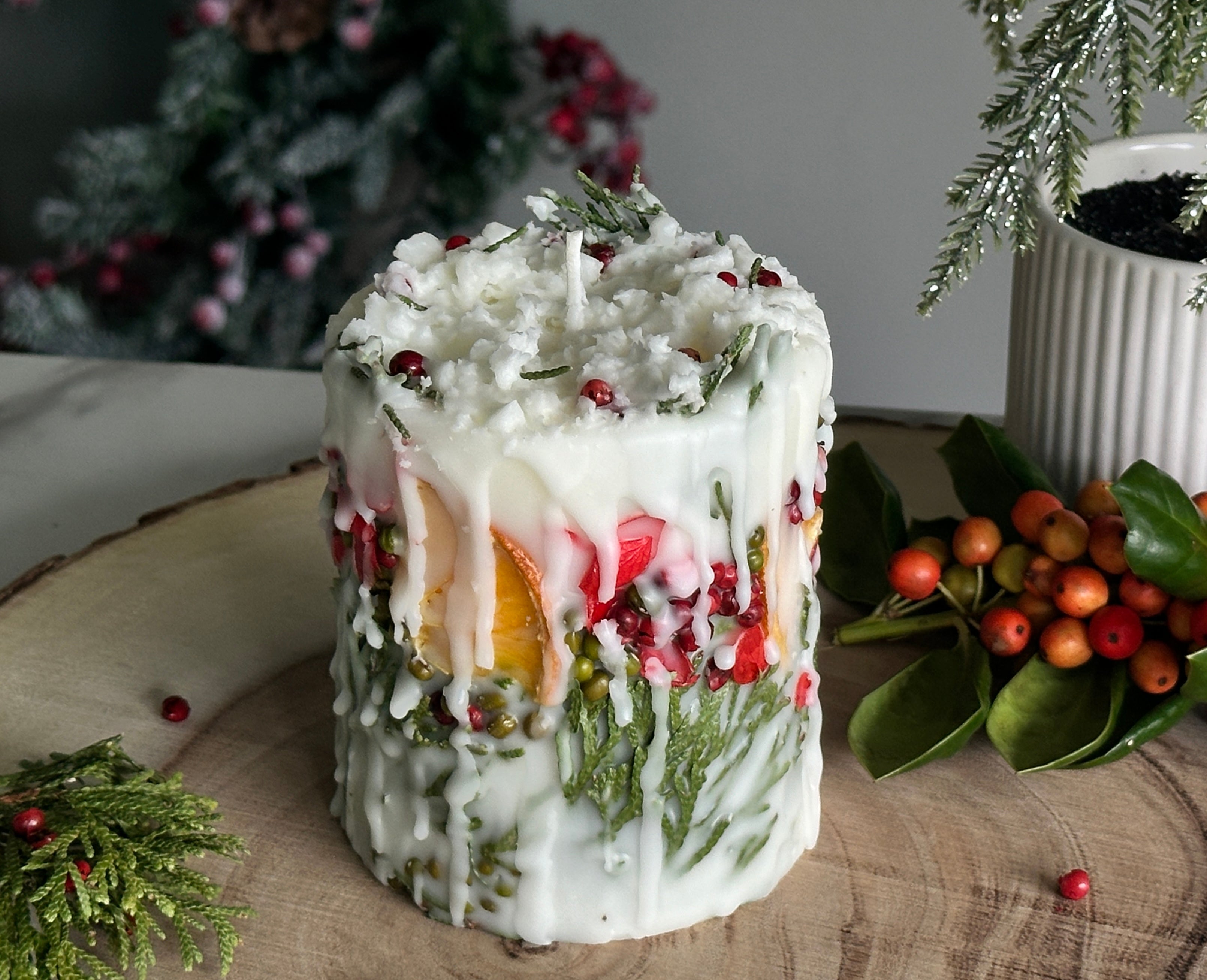 Botanical Christmas Candle: Rustic Holiday Decor with fir sprigs, orange and spices