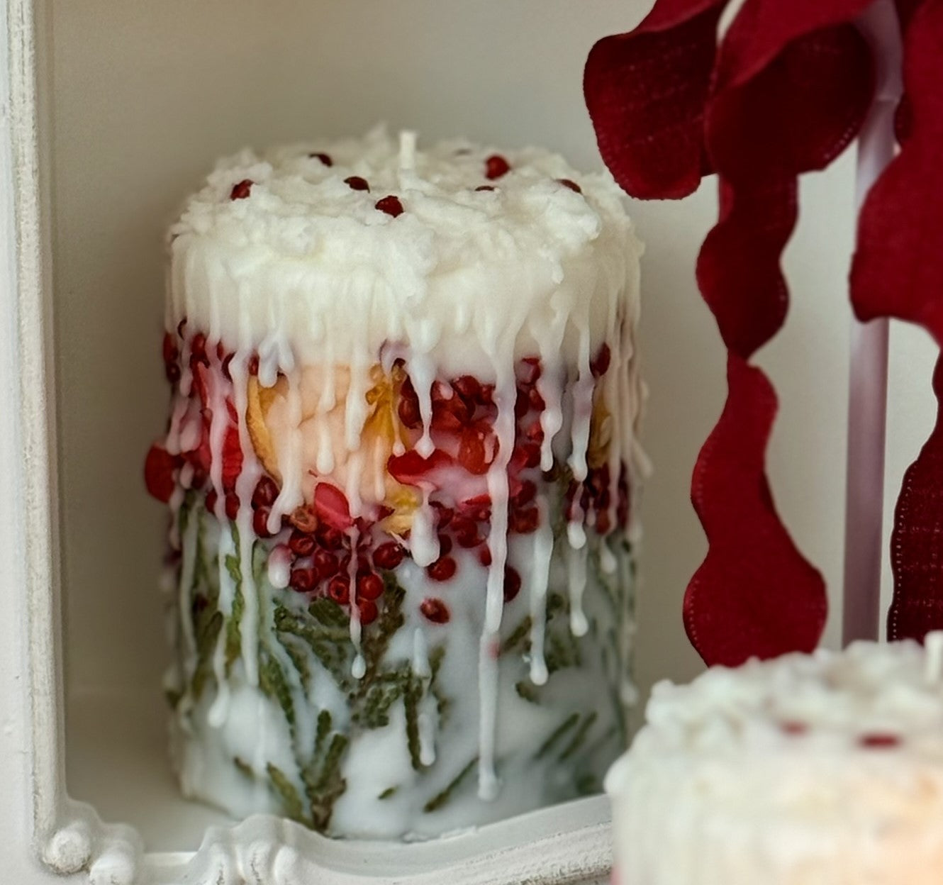 Botanical Christmas Candle: Rustic Holiday Decor with fir sprigs, orange and spices