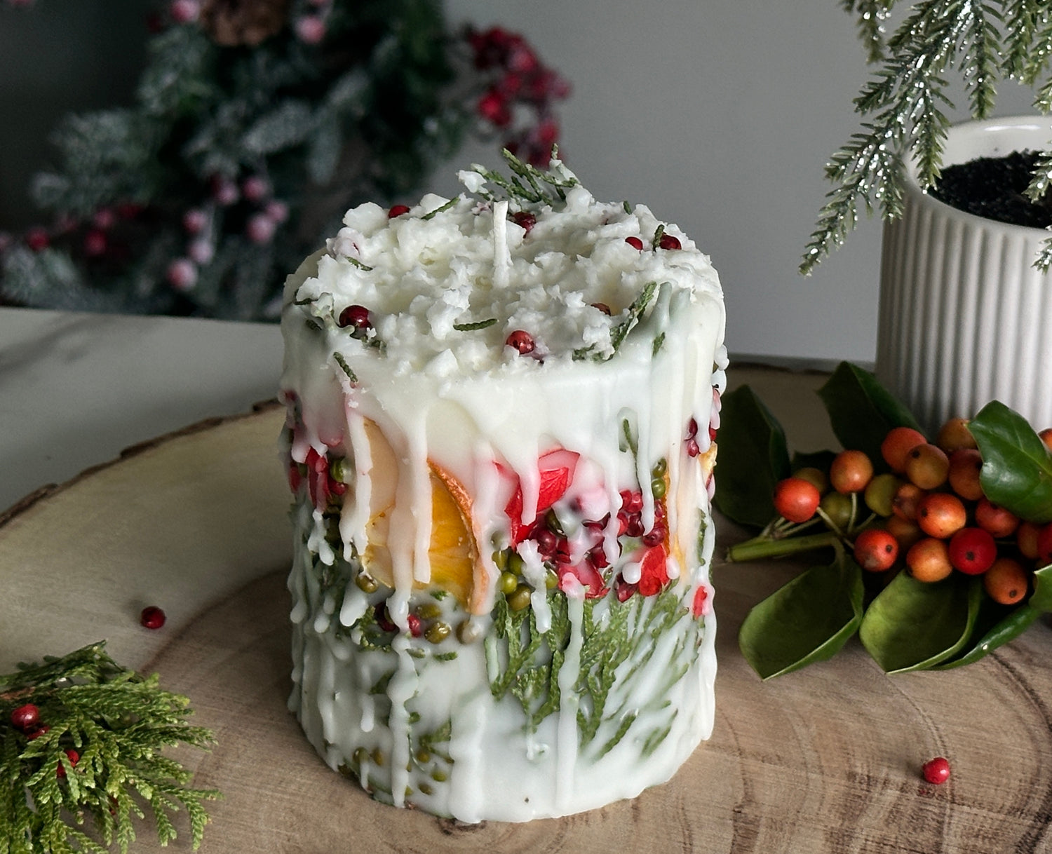 Botanical Christmas Candle: Rustic Holiday Decor with fir sprigs, orange and spices