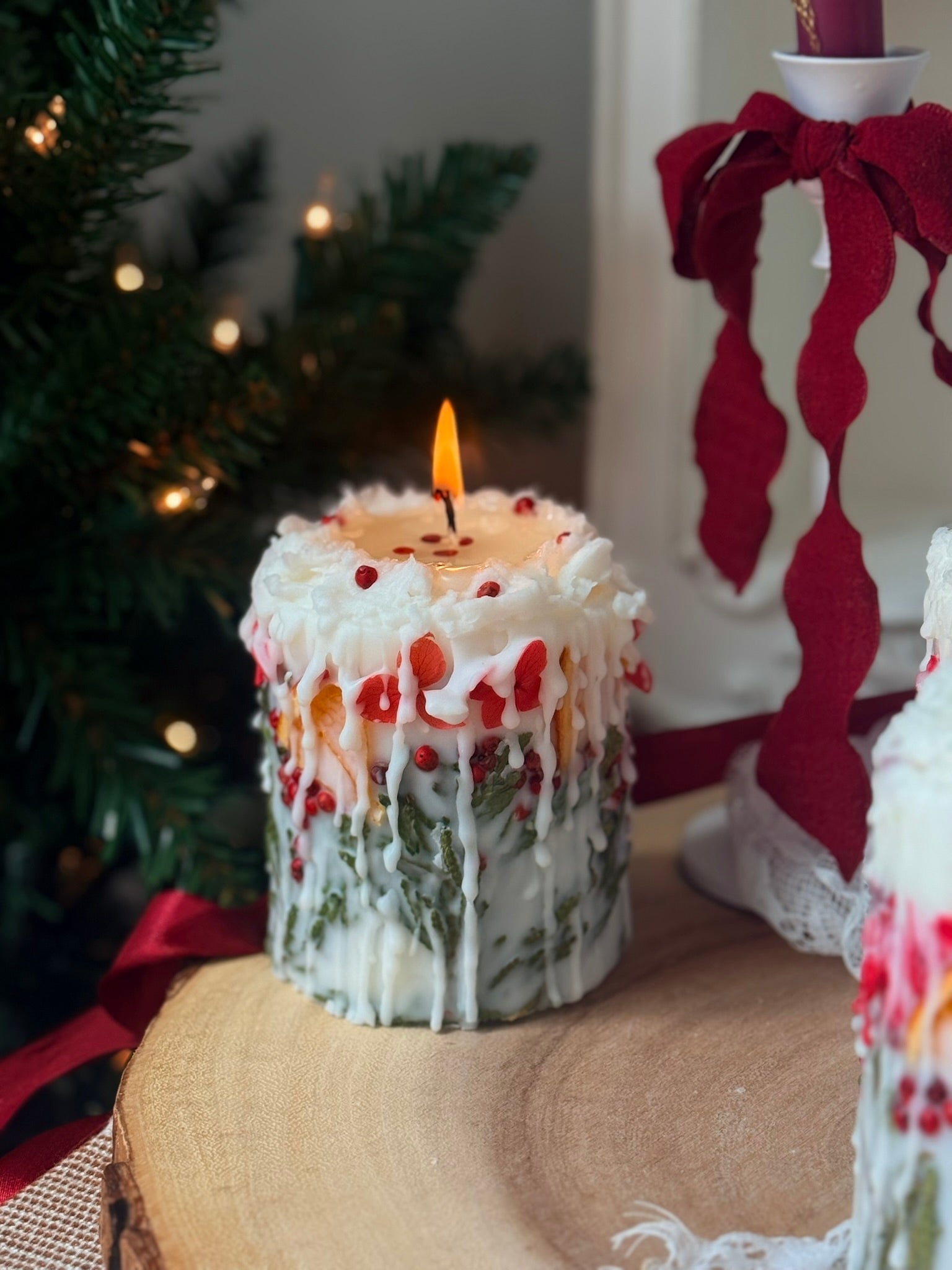 Botanical Christmas Candle: Rustic Holiday Decor with fir sprigs, orange and spices