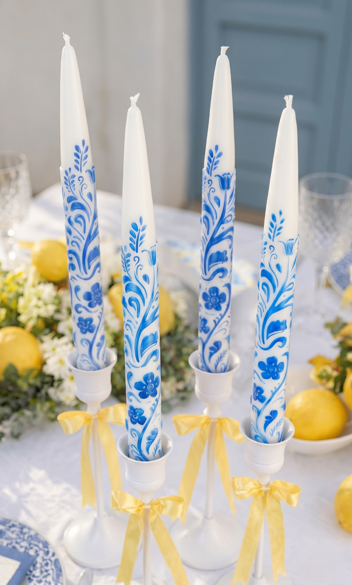 Blue and white taper candles styled for elegant spring table decor